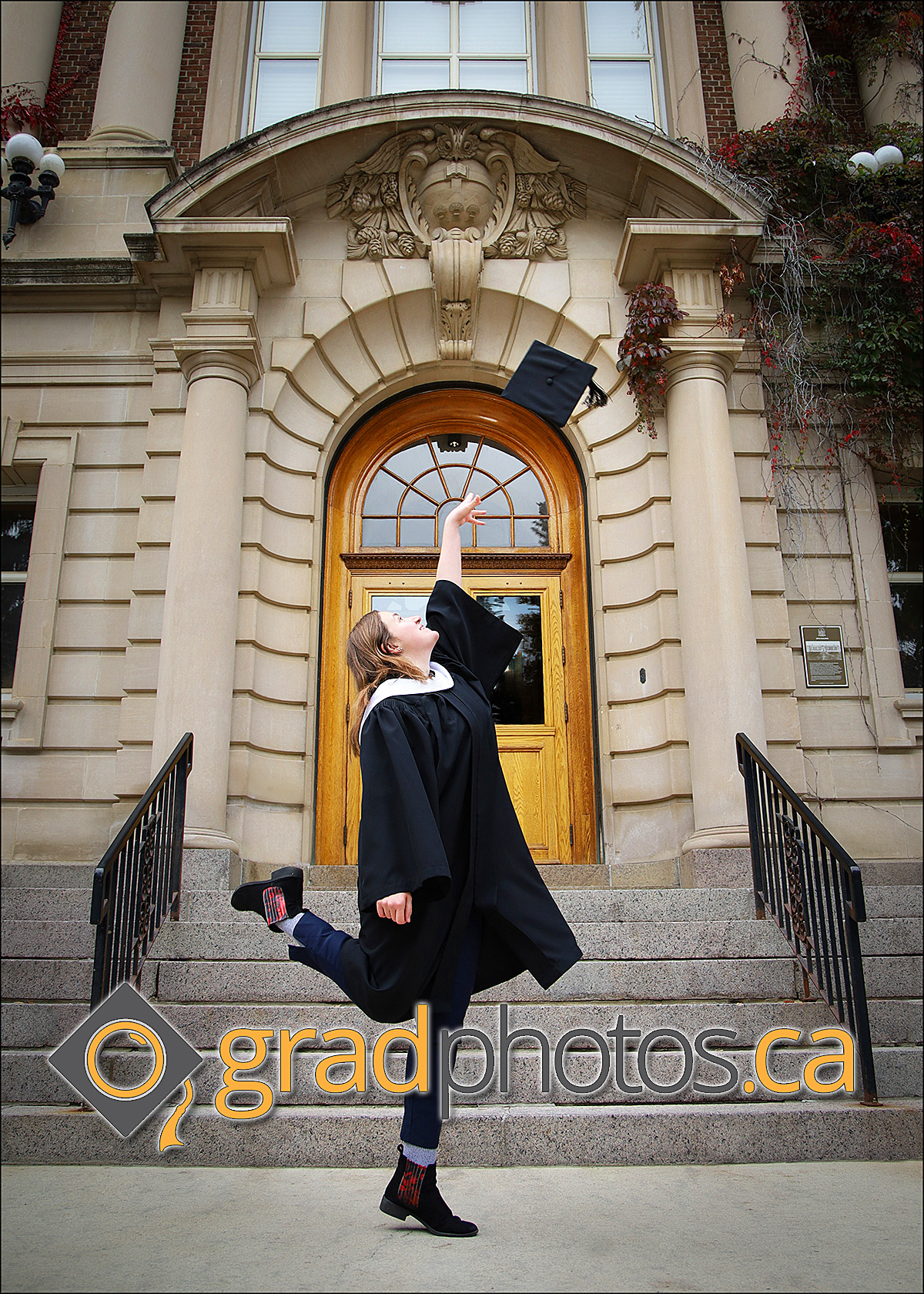 Graduate throwing hat